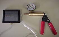 Place the VR Tray on a Vacuum Plate (VHP-24 Hand Pump shown in photo).